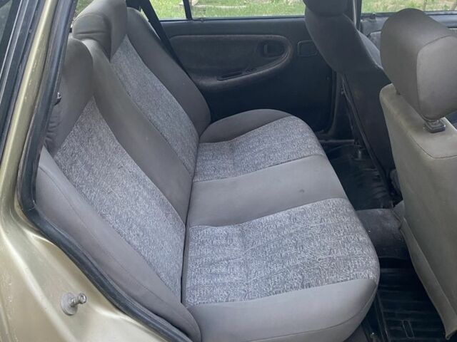 Бежевий Деу Нексія, об'ємом двигуна 1.5 л та пробігом 150 тис. км за 698 $, фото 5 на Automoto.ua