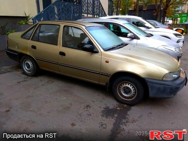 Бежевий Деу Нексія, об'ємом двигуна 1.5 л та пробігом 117 тис. км за 1655 $, фото 7 на Automoto.ua