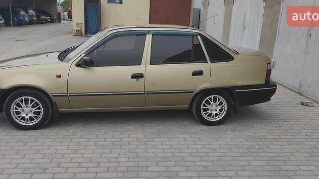 Бежевий Деу Нексія, об'ємом двигуна 1.5 л та пробігом 203 тис. км за 2500 $, фото 6 на Automoto.ua
