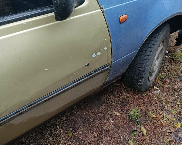 Бежевый Дэу Нексия, объемом двигателя 1.5 л и пробегом 192 тыс. км за 2000 $, фото 3 на Automoto.ua