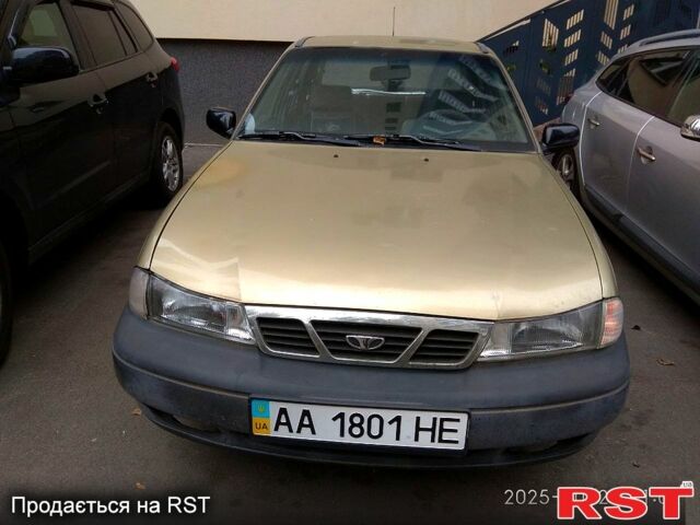 Бежевий Деу Нексія, об'ємом двигуна 1.5 л та пробігом 117 тис. км за 1655 $, фото 4 на Automoto.ua