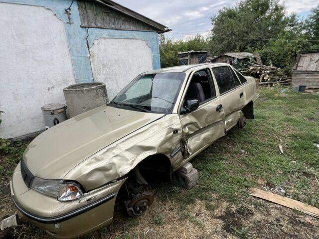 Бежевий Деу Нексія, об'ємом двигуна 1.6 л та пробігом 270 тис. км за 21000 $, фото 6 на Automoto.ua