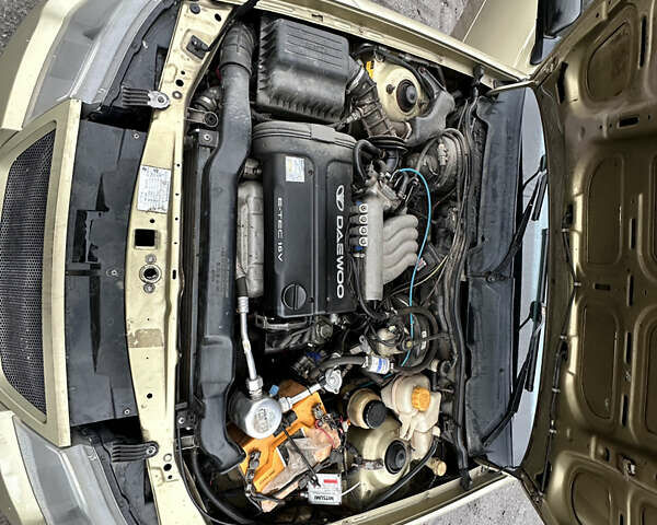 Бежевый Дэу Нексия, объемом двигателя 1.5 л и пробегом 254 тыс. км за 1950 $, фото 13 на Automoto.ua