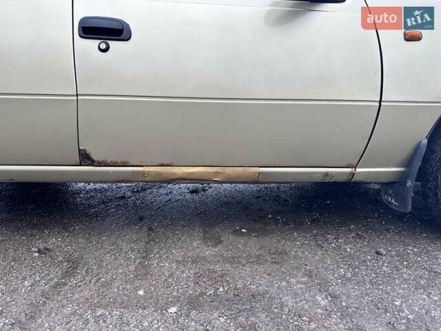 Бежевый Дэу Нексия, объемом двигателя 1.5 л и пробегом 254 тыс. км за 1950 $, фото 8 на Automoto.ua