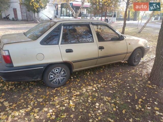 Бежевий Деу Нексія, об'ємом двигуна 1.6 л та пробігом 202 тис. км за 2800 $, фото 1 на Automoto.ua