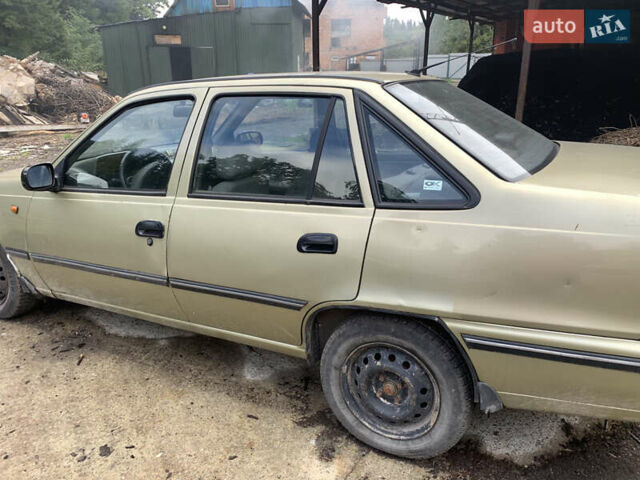 Бежевий Деу Нексія, об'ємом двигуна 1.5 л та пробігом 165 тис. км за 1200 $, фото 3 на Automoto.ua