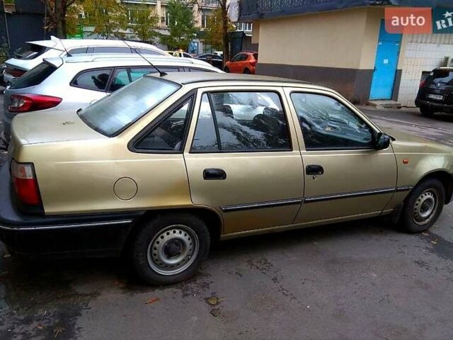 Бежевий Деу Нексія, об'ємом двигуна 1.5 л та пробігом 117 тис. км за 1655 $, фото 4 на Automoto.ua