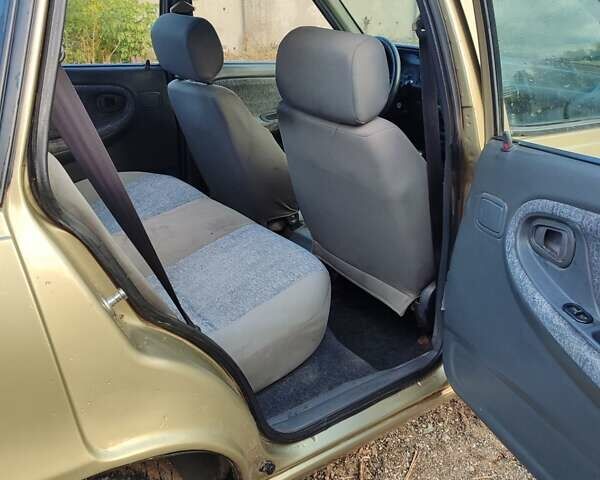 Бежевий Деу Нексія, об'ємом двигуна 1.5 л та пробігом 200 тис. км за 1450 $, фото 2 на Automoto.ua