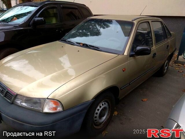 Бежевий Деу Нексія, об'ємом двигуна 1.5 л та пробігом 117 тис. км за 1655 $, фото 3 на Automoto.ua