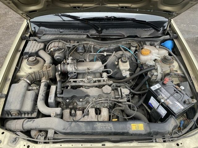 Бежевый Дэу Нексия, объемом двигателя 1.5 л и пробегом 137 тыс. км за 2300 $, фото 11 на Automoto.ua