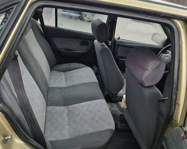 Бежевый Дэу Нексия, объемом двигателя 1.5 л и пробегом 133 тыс. км за 1750 $, фото 9 на Automoto.ua