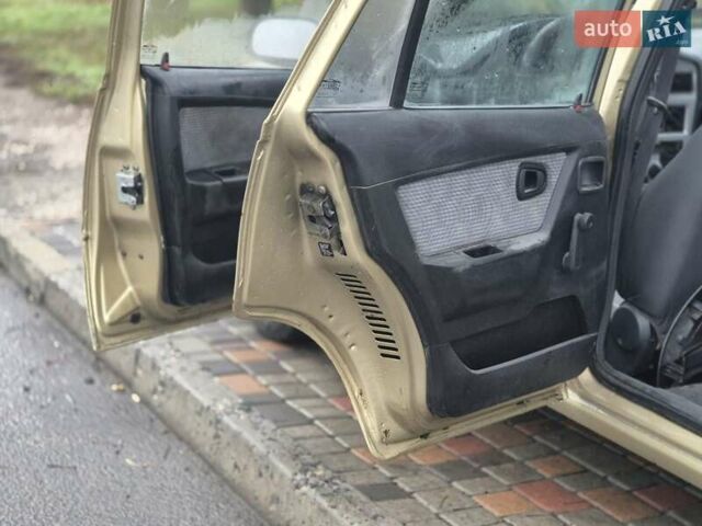 Бежевый Дэу Нексия, объемом двигателя 1.5 л и пробегом 133 тыс. км за 1799 $, фото 7 на Automoto.ua