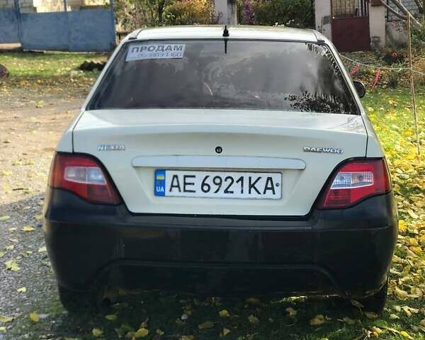 Бежевый Дэу Нексия, объемом двигателя 1.5 л и пробегом 200 тыс. км за 1499 $, фото 3 на Automoto.ua