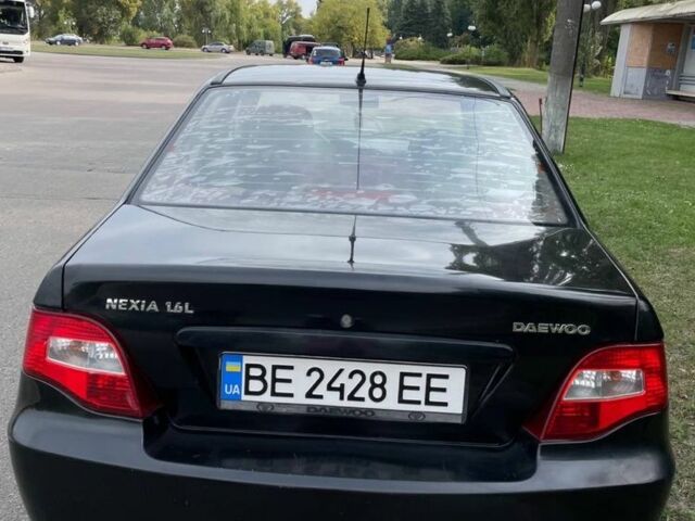 Чорний Деу Нексія, об'ємом двигуна 1.6 л та пробігом 330 тис. км за 1300 $, фото 6 на Automoto.ua