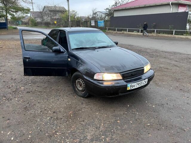 Чорний Деу Нексія, об'ємом двигуна 1.5 л та пробігом 150 тис. км за 1000 $, фото 5 на Automoto.ua