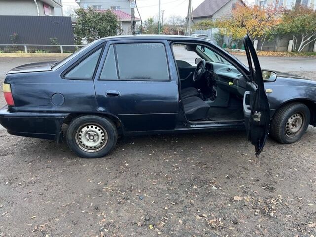 Чорний Деу Нексія, об'ємом двигуна 1.5 л та пробігом 150 тис. км за 1000 $, фото 8 на Automoto.ua