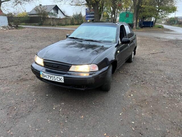Чорний Деу Нексія, об'ємом двигуна 1.5 л та пробігом 150 тис. км за 1000 $, фото 2 на Automoto.ua