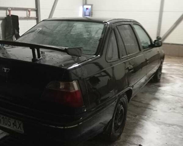 Дэу Нексия 1997 в Умани на Automoto.ua Черный Дэу Нексия, объемом двигателя 1.5 л и пробегом 300 тыс. км за 1000 $, фото 2 на Automoto.ua