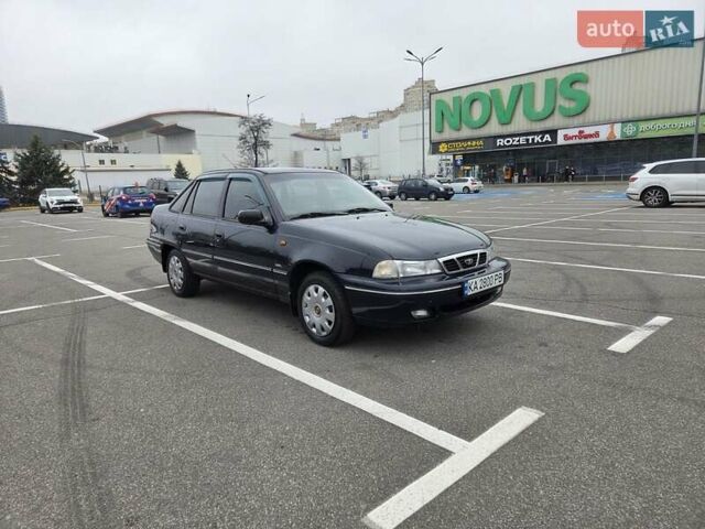 Черный Дэу Нексия, объемом двигателя 1.5 л и пробегом 141 тыс. км за 2800 $, фото 5 на Automoto.ua