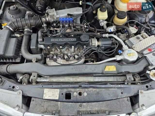 Черный Дэу Нексия, объемом двигателя 1.5 л и пробегом 141 тыс. км за 2800 $, фото 9 на Automoto.ua