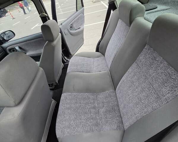 Черный Дэу Нексия, объемом двигателя 1.5 л и пробегом 141 тыс. км за 2800 $, фото 18 на Automoto.ua