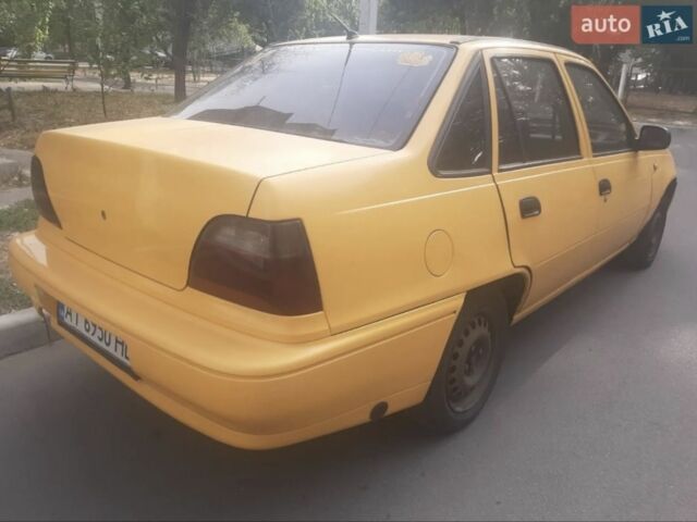 Черный Дэу Нексия, объемом двигателя 1.6 л и пробегом 245 тыс. км за 769 $, фото 2 на Automoto.ua