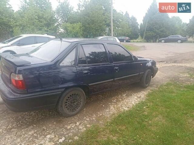 Черный Дэу Нексия, объемом двигателя 1.5 л и пробегом 100 тыс. км за 800 $, фото 1 на Automoto.ua