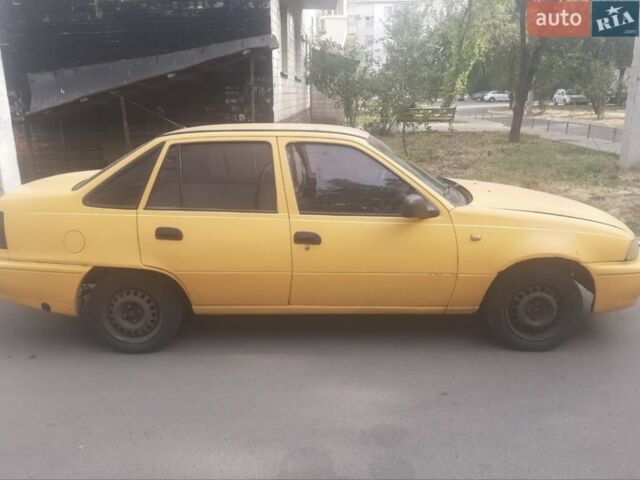 Черный Дэу Нексия, объемом двигателя 1.6 л и пробегом 245 тыс. км за 769 $, фото 1 на Automoto.ua