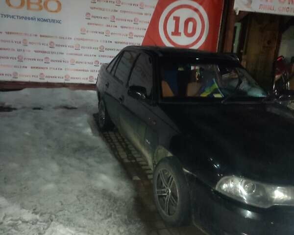 Черный Дэу Нексия, объемом двигателя 1.5 л и пробегом 160 тыс. км за 2550 $, фото 2 на Automoto.ua