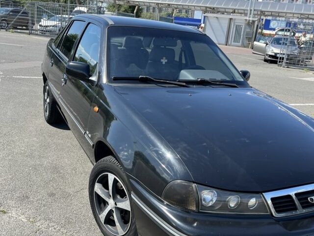 Чорний Деу Нексія, об'ємом двигуна 1.5 л та пробігом 140 тис. км за 2650 $, фото 11 на Automoto.ua