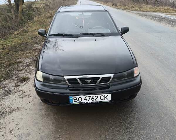 Черный Дэу Нексия, объемом двигателя 1.5 л и пробегом 150 тыс. км за 1400 $, фото 2 на Automoto.ua