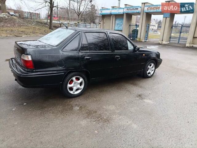 Черный Дэу Нексия, объемом двигателя 1.5 л и пробегом 150 тыс. км за 1400 $, фото 9 на Automoto.ua