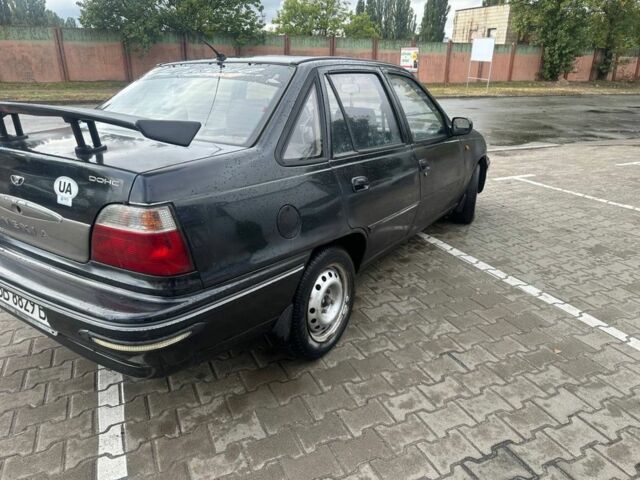 Черный Дэу Нексия, объемом двигателя 1.5 л и пробегом 213 тыс. км за 850 $, фото 1 на Automoto.ua