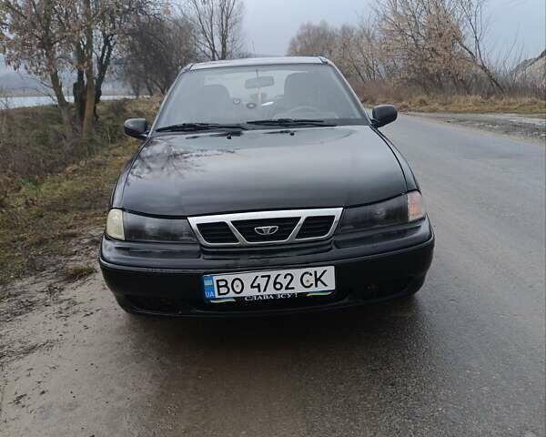 Черный Дэу Нексия, объемом двигателя 1.5 л и пробегом 150 тыс. км за 1400 $, фото 11 на Automoto.ua