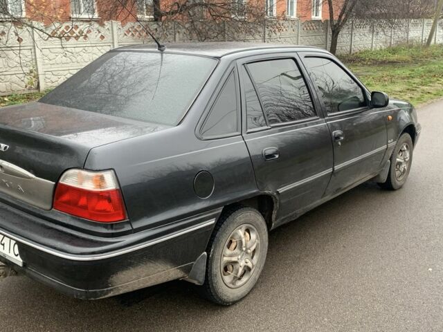 Черный Дэу Нексия, объемом двигателя 1.5 л и пробегом 200 тыс. км за 999 $, фото 3 на Automoto.ua