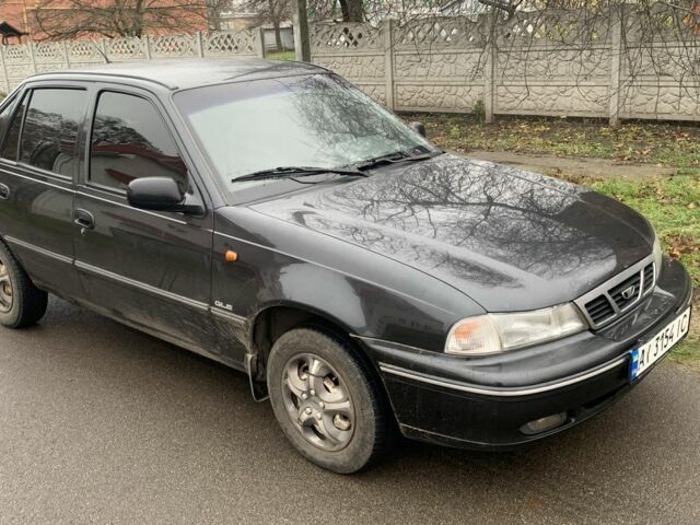 Черный Дэу Нексия, объемом двигателя 1.5 л и пробегом 200 тыс. км за 999 $, фото 2 на Automoto.ua