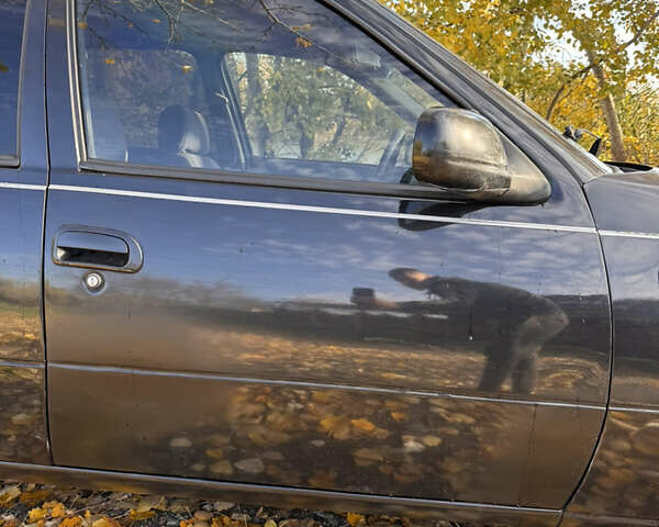 Чорний Деу Нексія, об'ємом двигуна 1.5 л та пробігом 230 тис. км за 1880 $, фото 4 на Automoto.ua