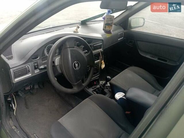 Черный Дэу Нексия, объемом двигателя 1.5 л и пробегом 467 тыс. км за 1450 $, фото 3 на Automoto.ua