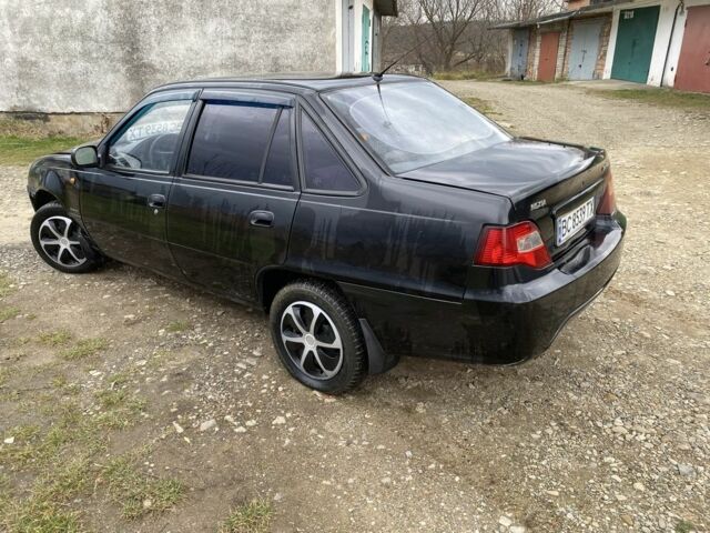 Черный Дэу Нексия, объемом двигателя 1.5 л и пробегом 90 тыс. км за 800 $, фото 1 на Automoto.ua