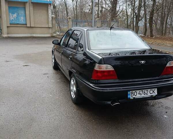 Черный Дэу Нексия, объемом двигателя 1.5 л и пробегом 150 тыс. км за 1400 $, фото 7 на Automoto.ua