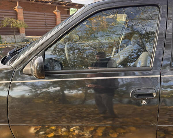 Чорний Деу Нексія, об'ємом двигуна 1.5 л та пробігом 230 тис. км за 1880 $, фото 12 на Automoto.ua