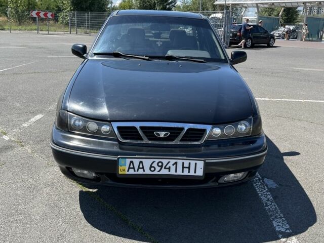 Чорний Деу Нексія, об'ємом двигуна 1.5 л та пробігом 140 тис. км за 2650 $, фото 4 на Automoto.ua