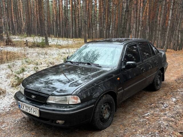 Черный Дэу Нексия, объемом двигателя 1.5 л и пробегом 570 тыс. км за 950 $, фото 1 на Automoto.ua