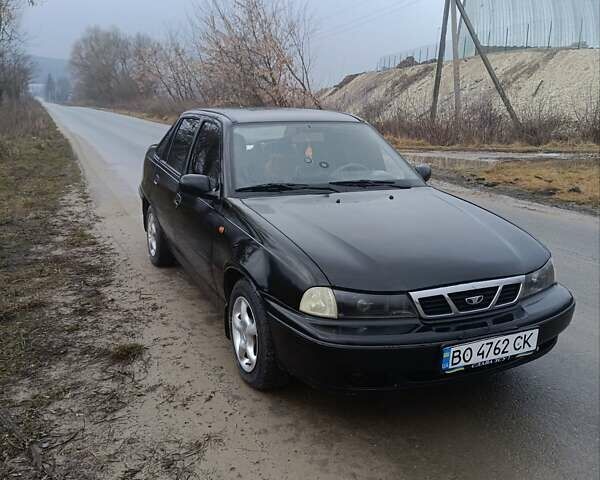 Черный Дэу Нексия, объемом двигателя 1.5 л и пробегом 150 тыс. км за 1400 $, фото 1 на Automoto.ua