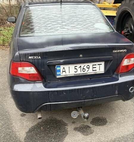 Чорний Деу Нексія, об'ємом двигуна 1.5 л та пробігом 200 тис. км за 1650 $, фото 1 на Automoto.ua