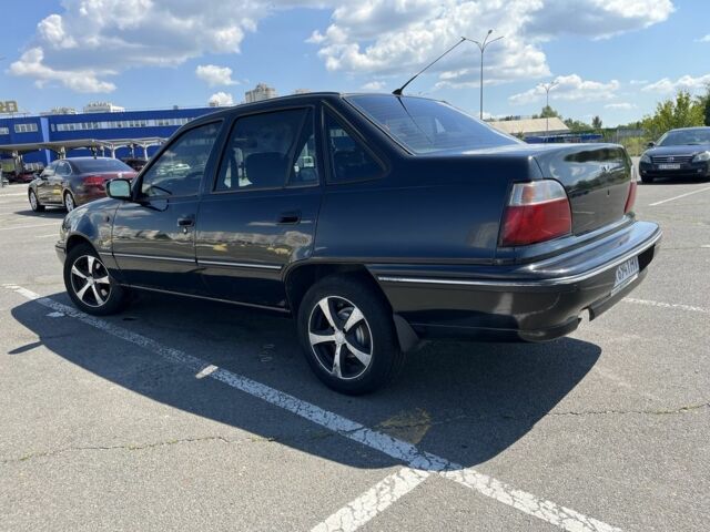 Чорний Деу Нексія, об'ємом двигуна 1.5 л та пробігом 140 тис. км за 2650 $, фото 3 на Automoto.ua