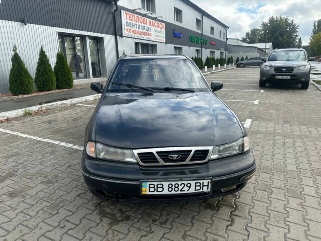 Черный Дэу Нексия, объемом двигателя 1.5 л и пробегом 213 тыс. км за 850 $, фото 2 на Automoto.ua