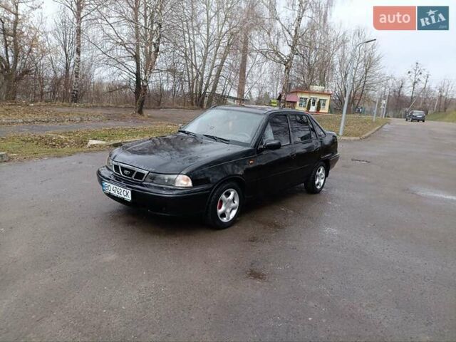 Черный Дэу Нексия, объемом двигателя 1.5 л и пробегом 150 тыс. км за 1400 $, фото 5 на Automoto.ua