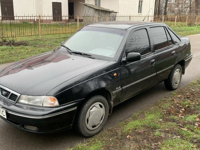 Черный Дэу Нексия, объемом двигателя 1.5 л и пробегом 200 тыс. км за 999 $, фото 1 на Automoto.ua