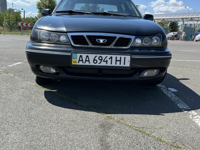 Чорний Деу Нексія, об'ємом двигуна 1.5 л та пробігом 140 тис. км за 2650 $, фото 16 на Automoto.ua